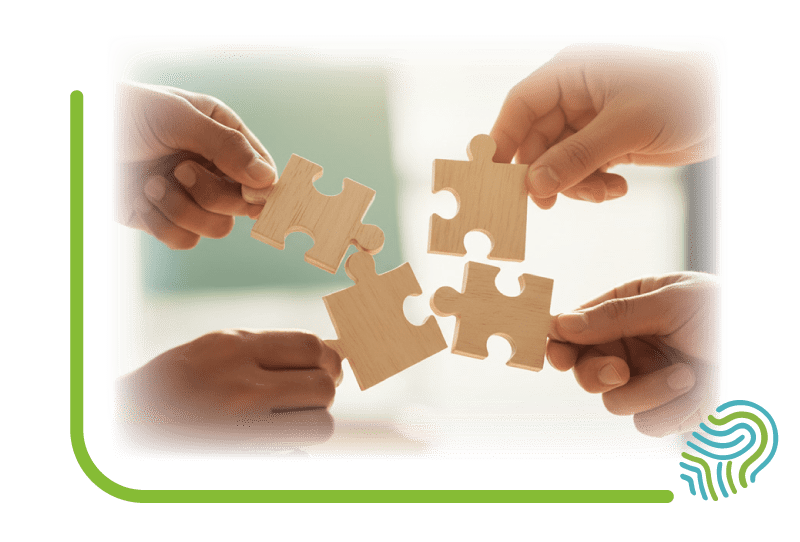 Unser Experten-Team | Gemeinsam für Ihre Gesundheit Vier Hände fügen Puzzleteile zusammen, was die interdisziplinäre Zusammenarbeit des Energy for Health Teams aus Wissenschaftlern, medizinischen Fachangestellten und Mikronährstoff-Experten symbolisiert.<br />